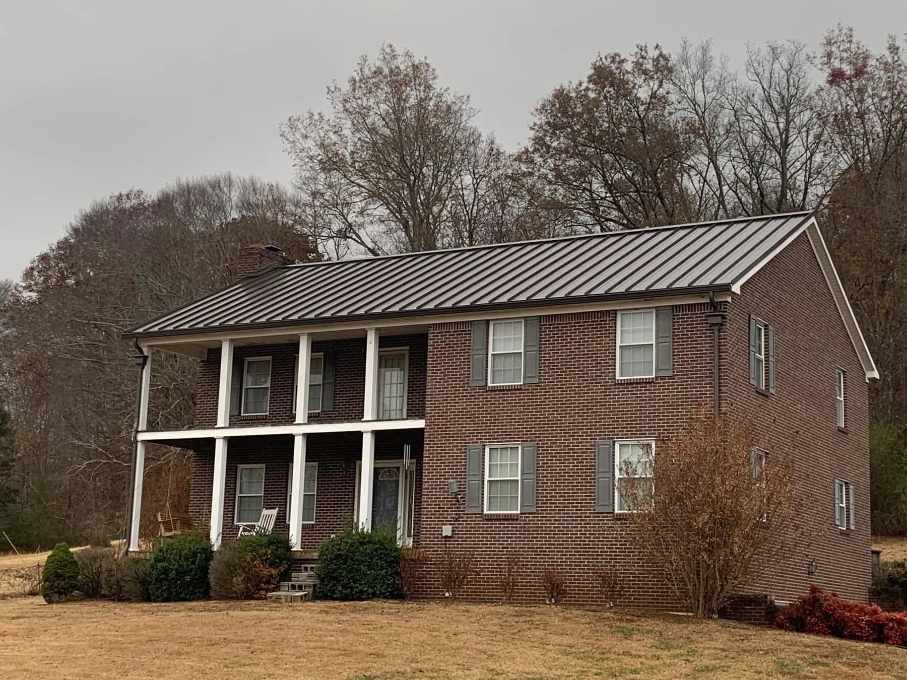 Brick home with a completed metal roof