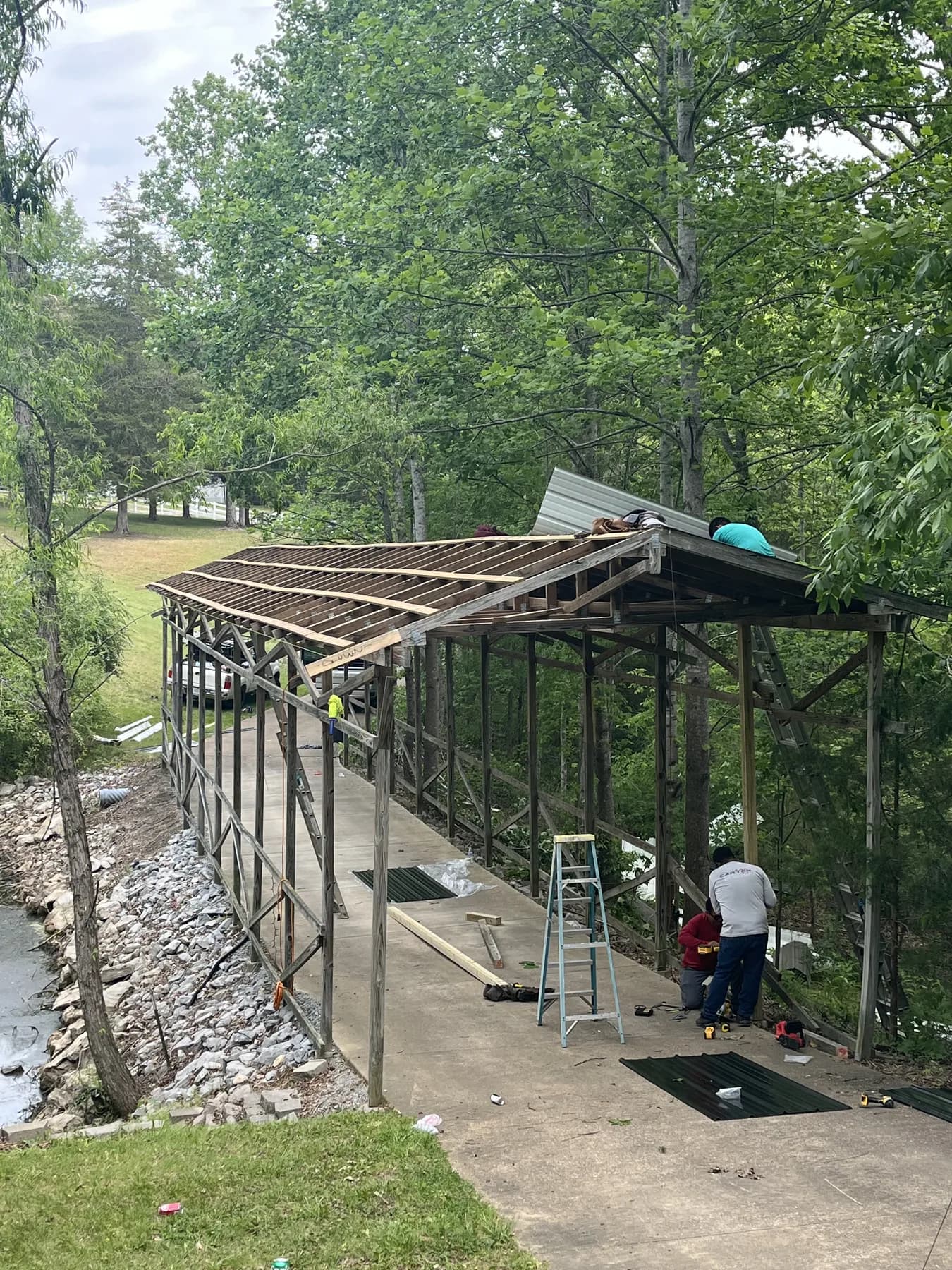 Close view of covered porch roof framing