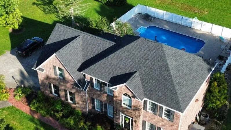 Drone view of a completed Four Brothers Roofing shingle roof